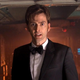 David Tennant's 10th Doctor looks disturbed while wearing a tuxedo.